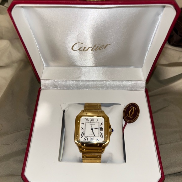 Cartier Other - Cartier Santos (large) gold. First bid for $2500 it’s yours! Don’t miss it :)